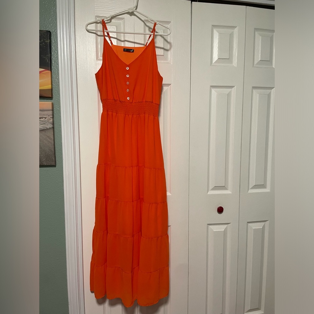 Summer dress, size small, color orange. Brand is pretty garden.